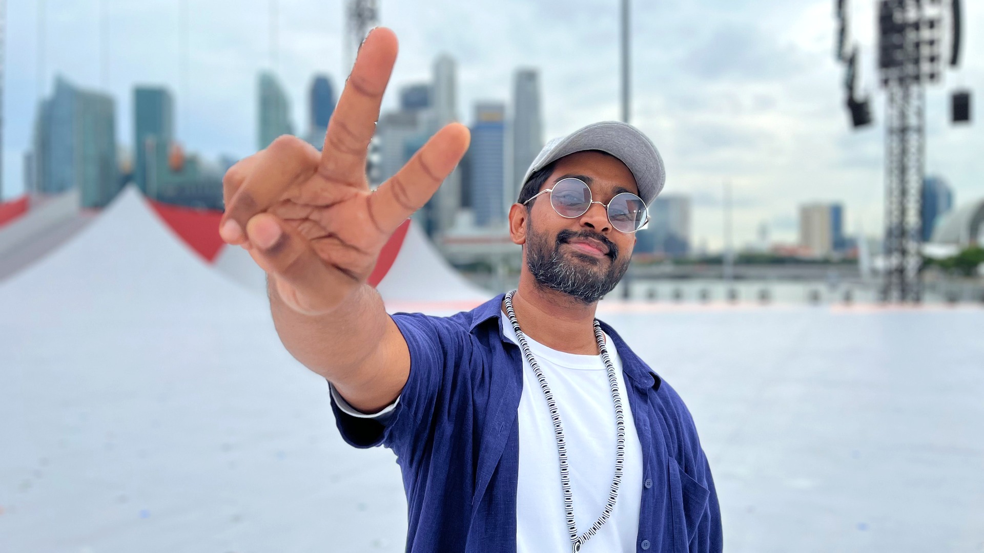 Shabir performing an upbeat reinterpretation of his National Day song, "Singai Naadu", at National Day Parade (NDP)