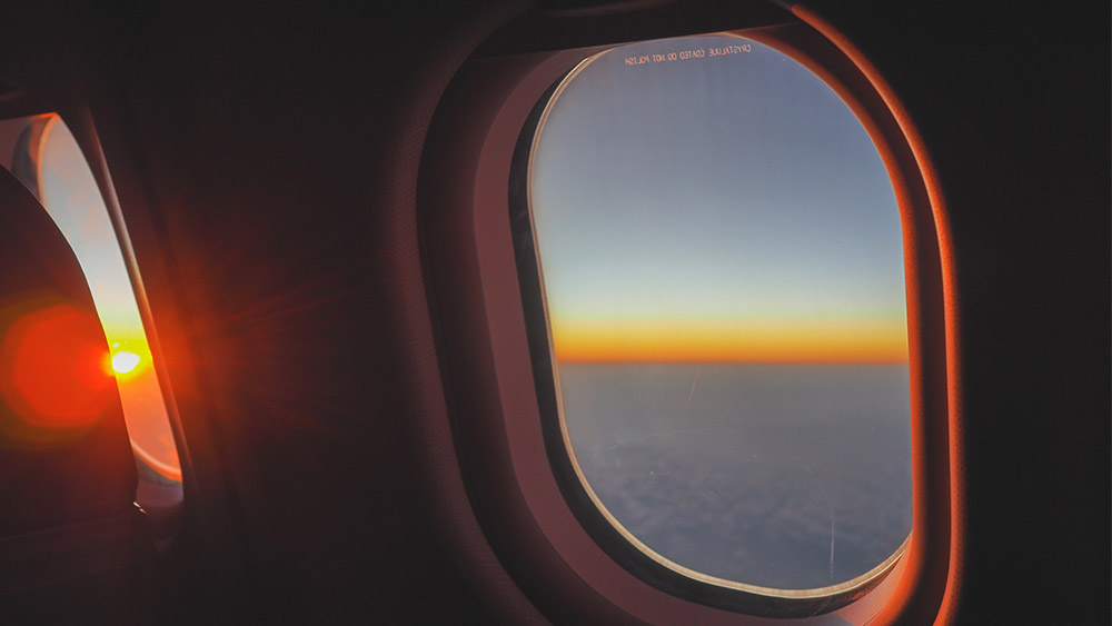 sunrise outside of plane window