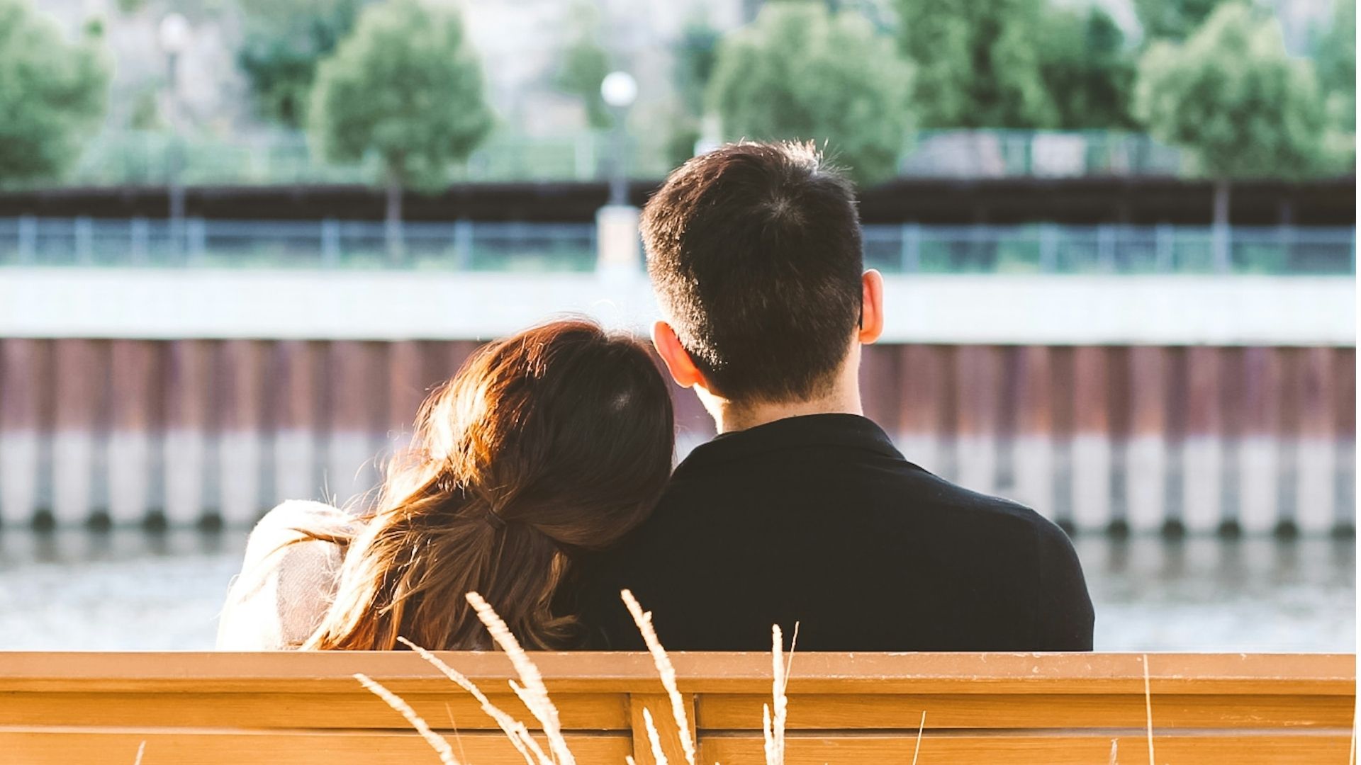 couple sitting on bench